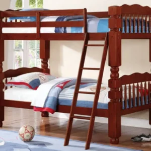 A bunk bed with ladder and ball on the bottom.